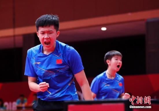 資料圖：雅加達亞運會，王楚欽/孫穎莎奪得混雙冠軍。 <a target='_blank' href='/'>中新社</a>記者 劉關關 攝