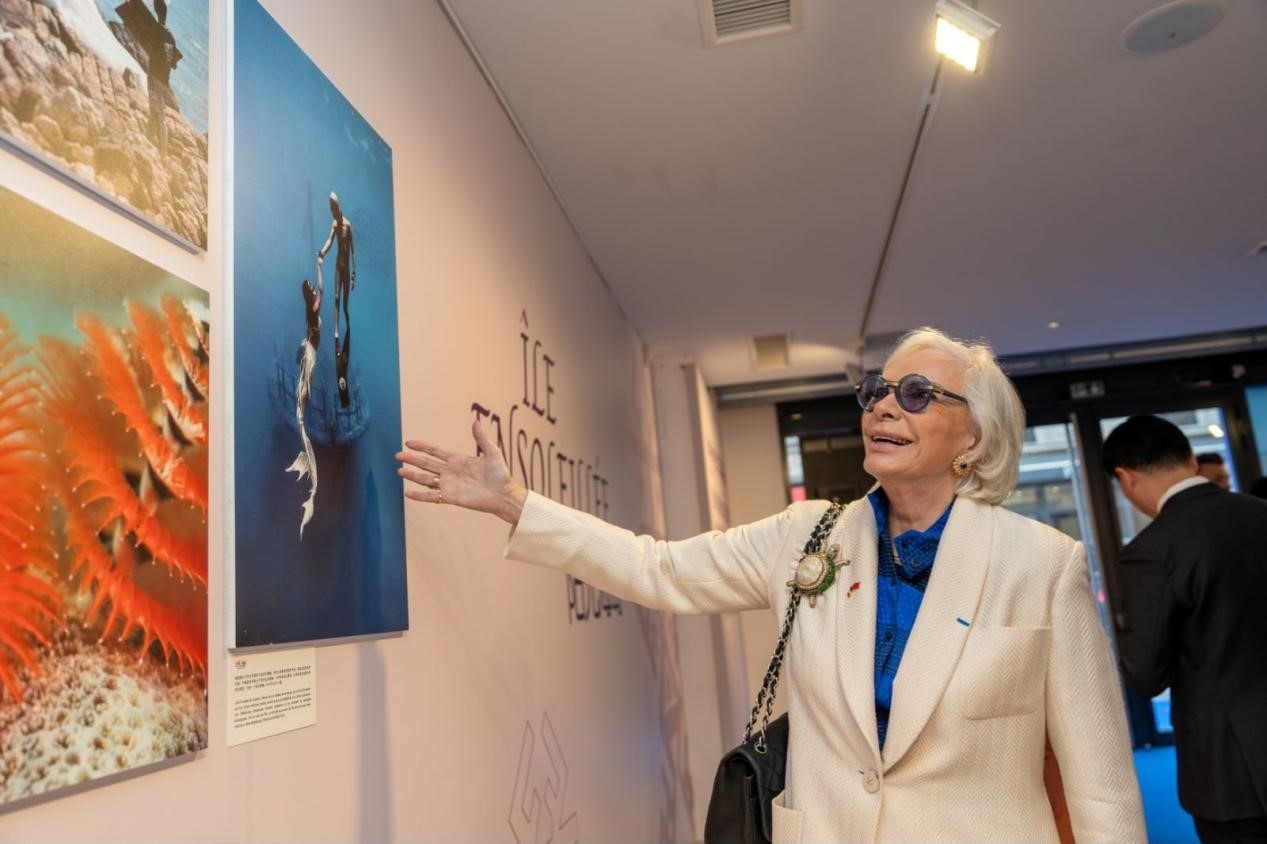 世界旅游組織特別顧問瑪麗-皮埃爾·布歇-奧利耶觀看活動現(xiàn)場圖片展覽?；顒又鬓k方供圖