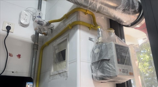 北京市石景山區(qū)高井路社區(qū)更換燃?xì)夤艿篮蟮木用窦?。人民網(wǎng) 劉佳欣攝