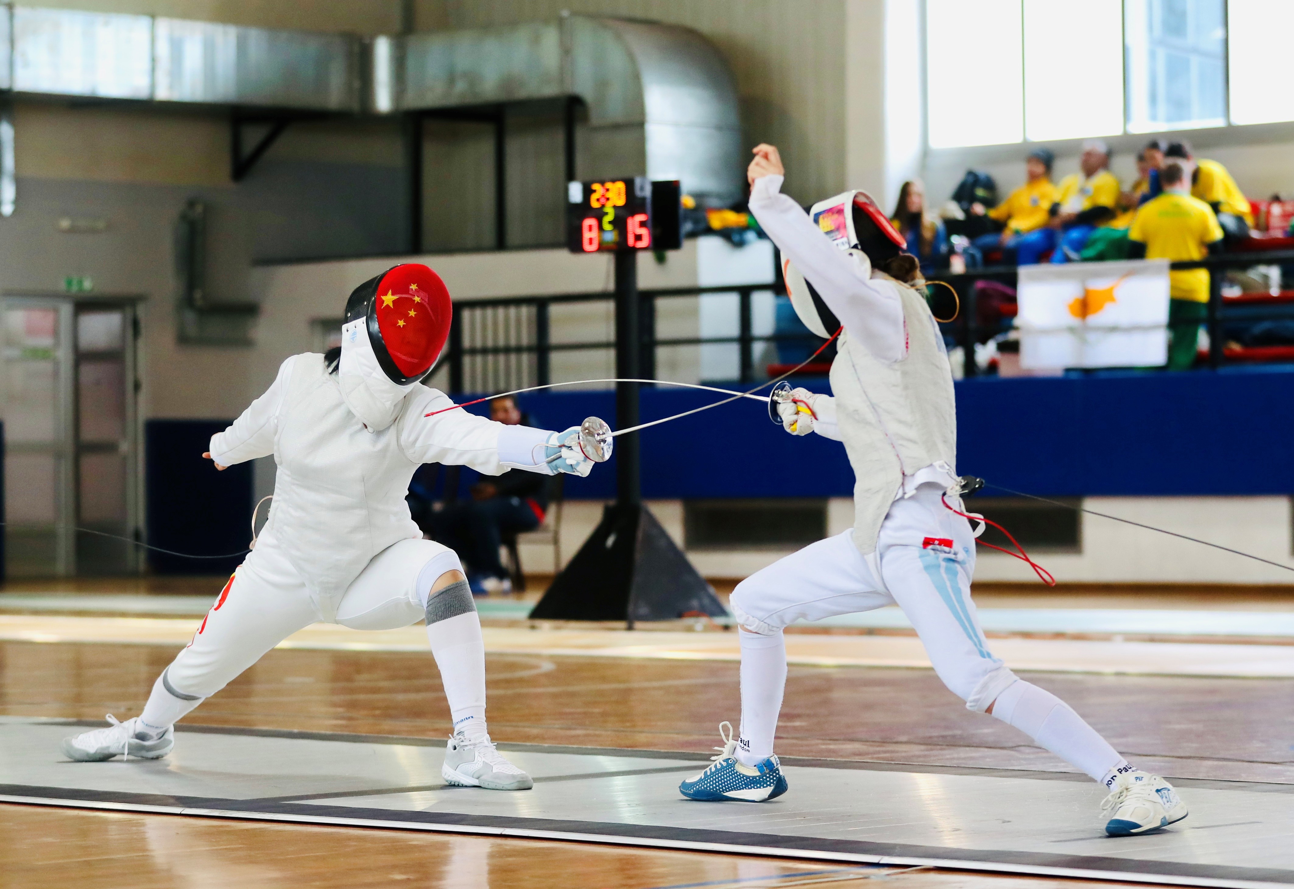 閔文珺（左）在比賽中。圖片來源：中國中學(xué)生體育代表團